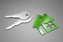 Afbeelding sleutels met huis sleutelhanger vrijstelling overdrachtsbelasting 2021